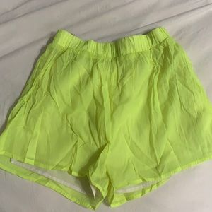 Neon yellow track high shorts